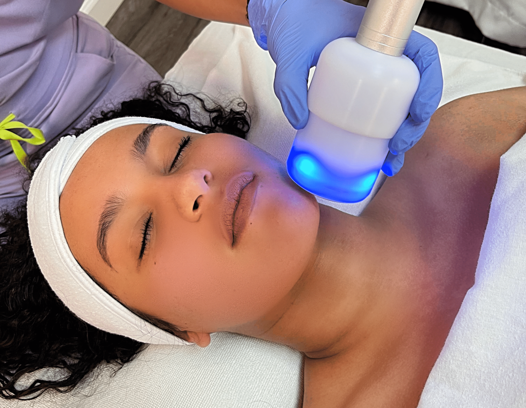 Cryo Facial applicator guided along a guest's jawline